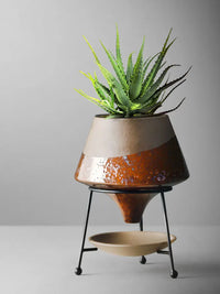 ceramic flower pot with modern metal stand
