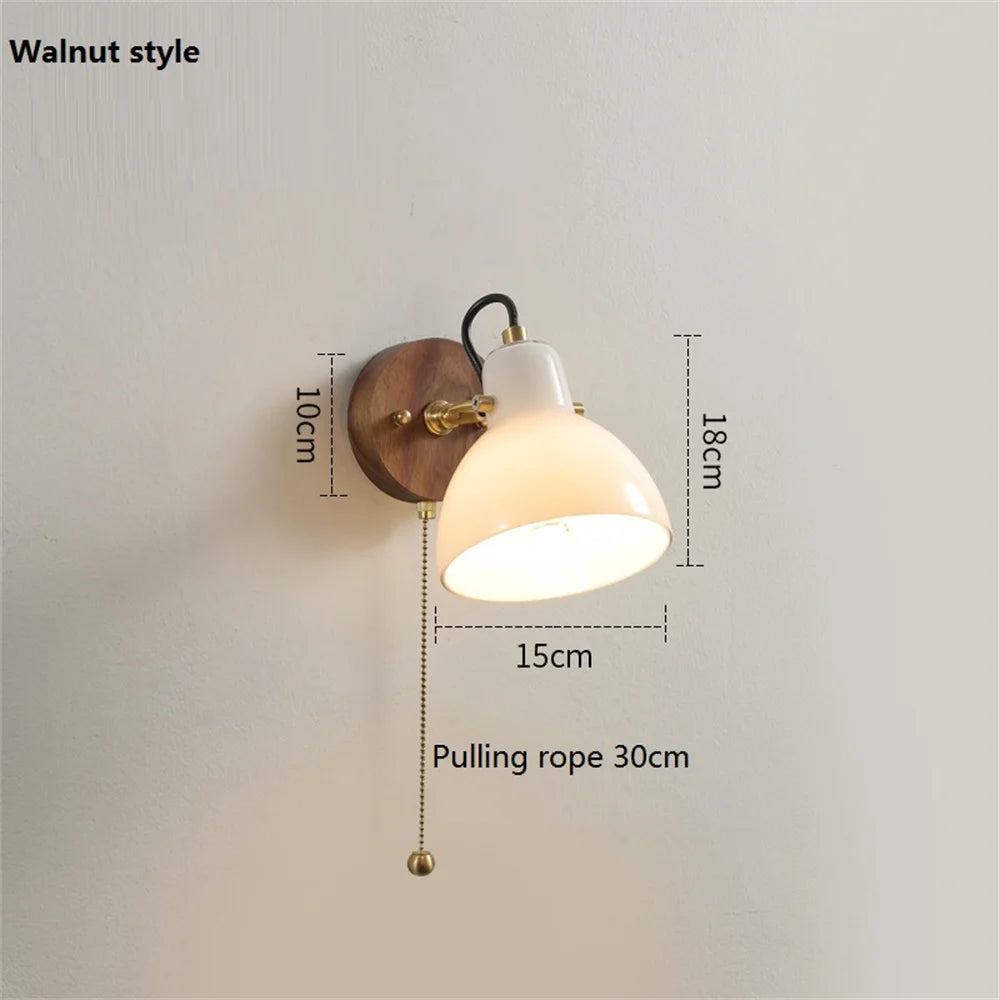Modern glass and brass wall light with switch