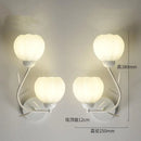 Pumpkin-shaped wall light for indoor decor