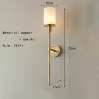 Natural marble wall light with brass bulb