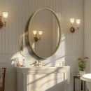 Brushed gold mirror with decorative metal frame