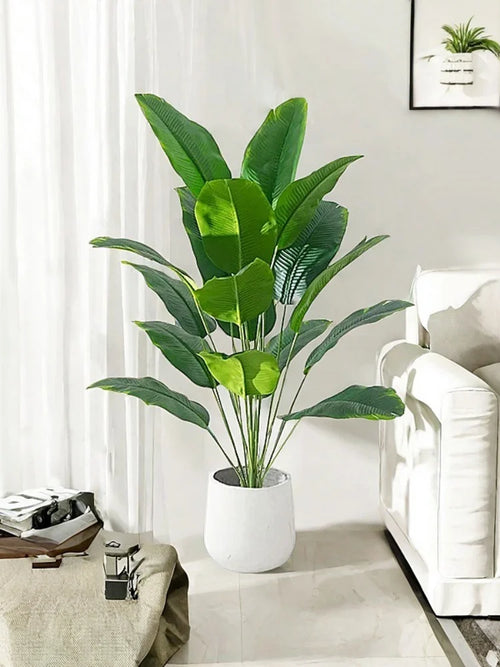 Artificial banana tree and tropical palm plants for festive decoration