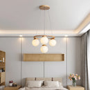Modern wood and glass pendant light for interiors 2024