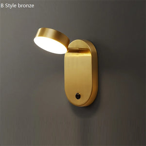 Swivel brass LED wall light with switch for reading