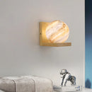Modern wooden wall light with planet LED shade