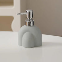 Portable ceramic soap dispenser for shampoo and water