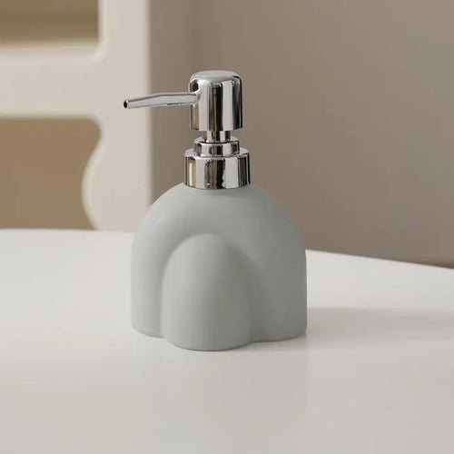 Portable ceramic soap dispenser for shampoo and water