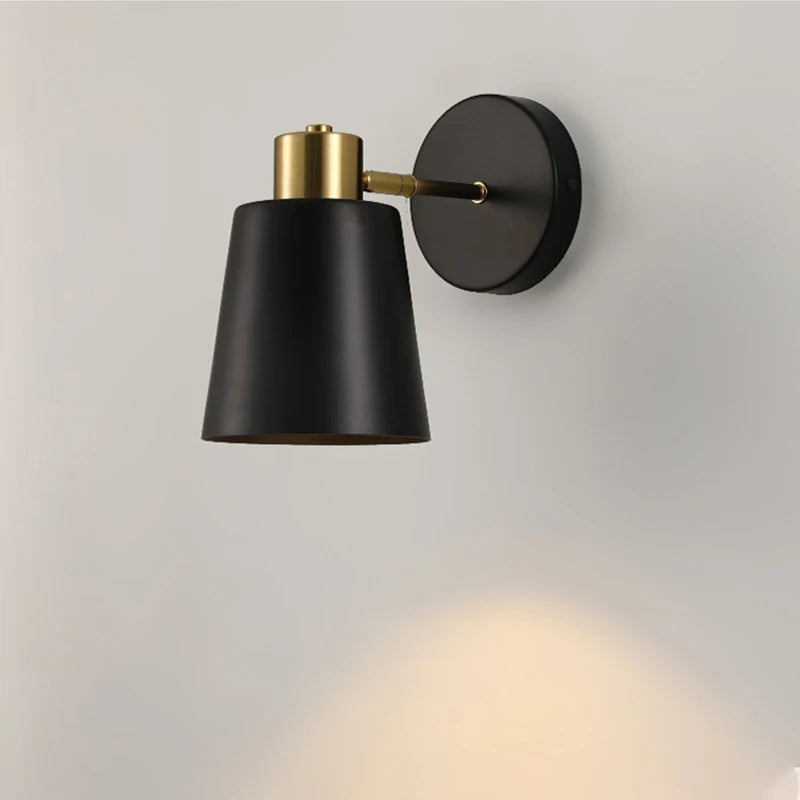 Vintage adjustable wall light for indoor décor in black brass
