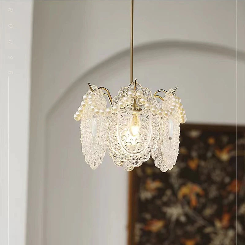 Modern glass chandelier with minimalist design for elegant interiors