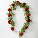 Artificial pink flowers and green plants for indoor decoration