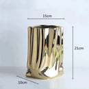 ceramic vase with silver frills for decorative flowers