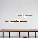 Modern walnut wood and glass chandelier for an elegant interior