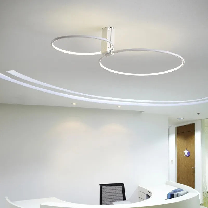 Modern circular LED ceiling light with creative 360-degree rotation - vue 5 sur 11