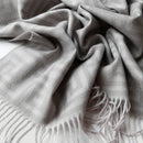 Jacquard wool throw with meander pattern, warm Chinese style