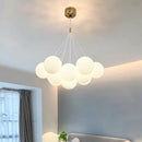 Modern glass chandelier with white LED spheres for living and dining room