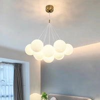 Modern glass chandelier with white LED spheres for living and dining room