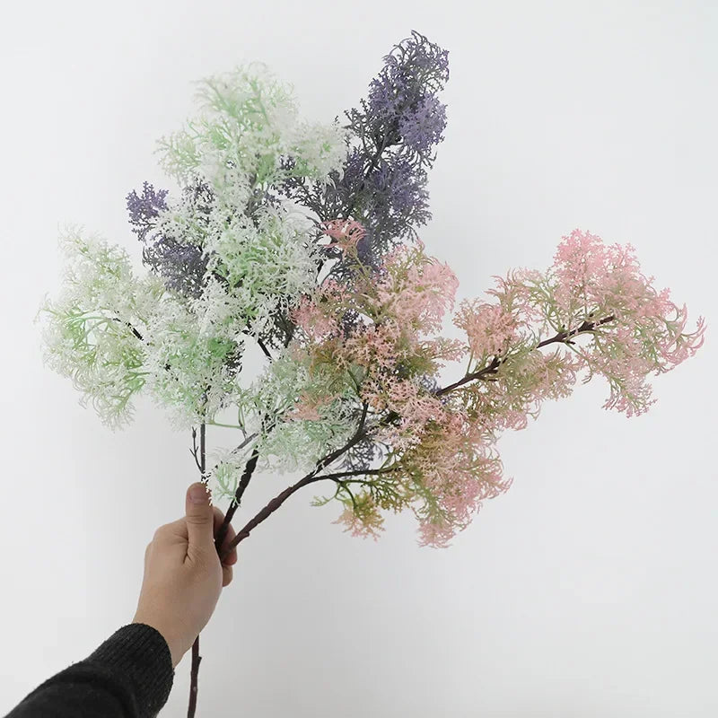 Decorative artificial grass plant for interiors