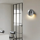 Modern iron and acrylic wall light with elegant design for interiors