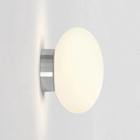 Minimalist glass wall light for modern interiors