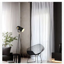 Danish design floor lamp with elegant nordic tripod