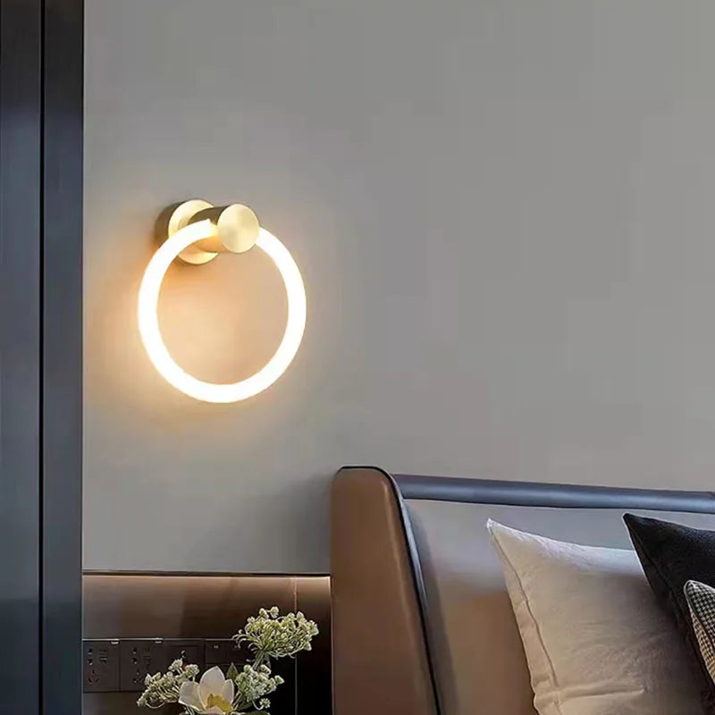 Modern brass LED wall light with acrylic ring, 3 colour dimmable