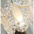 Modern glass chandelier with minimalist design for elegant interiors