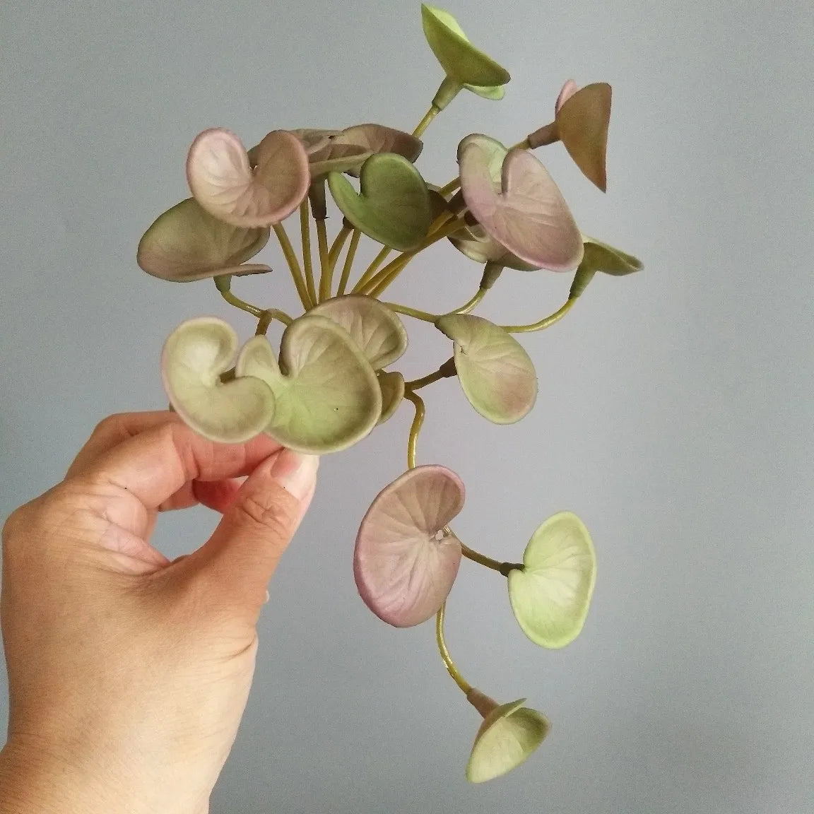 Artificial tropical foliage faux decorative bouquet