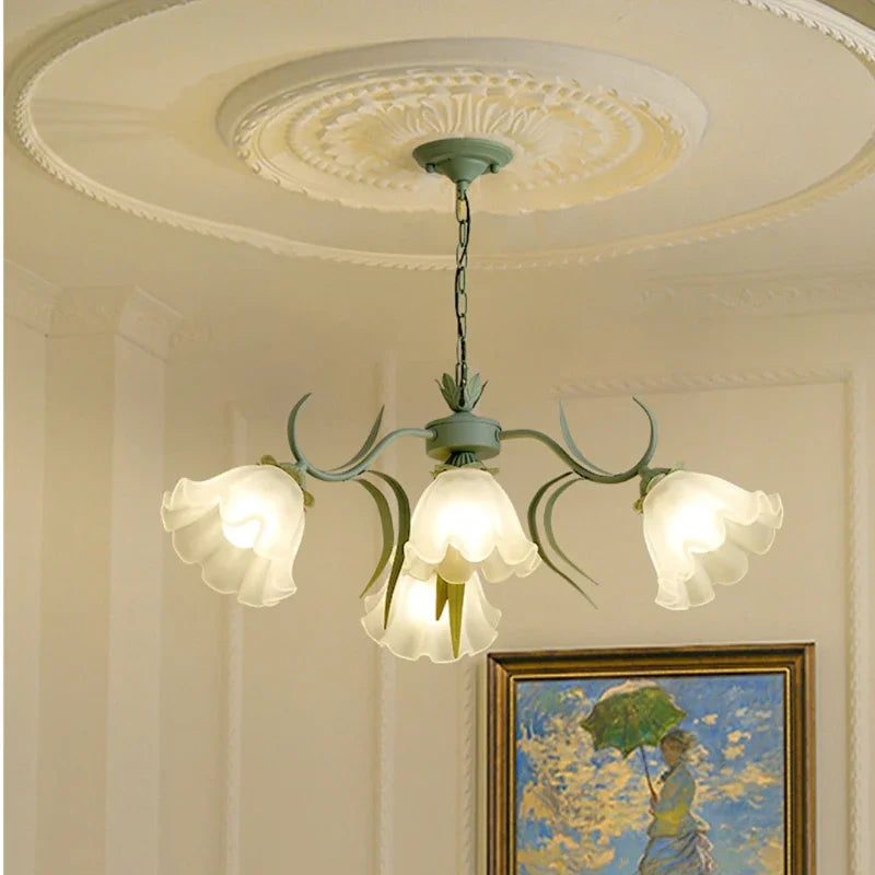 French-style glass chandelier with lily of the valley flowers