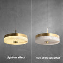White marble and copper pendant light for elegant interiors
