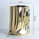 ceramic vase with silver frills for decorative flowers