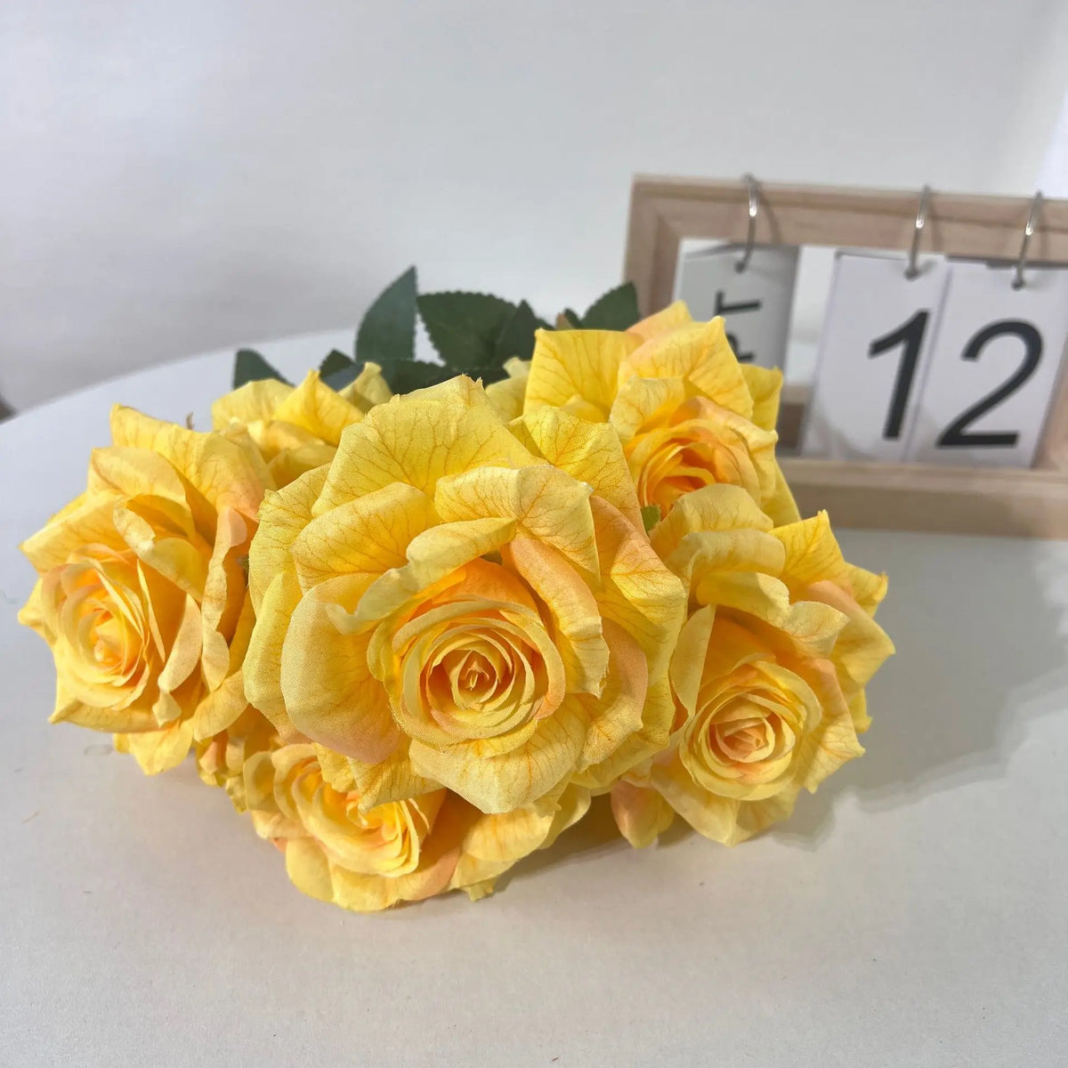 Decorative artificial silk rose bouquet for interior