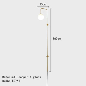 Modern and elegant brass indoor wall light
