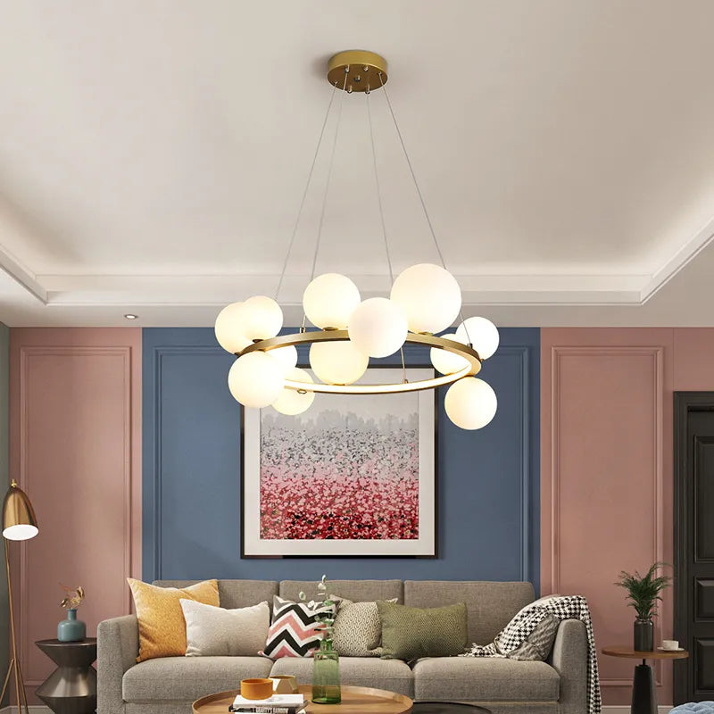 Round designer chandelier with clear glass LED globes