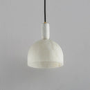 Alabaster pendant light with copper base for elegant interiors