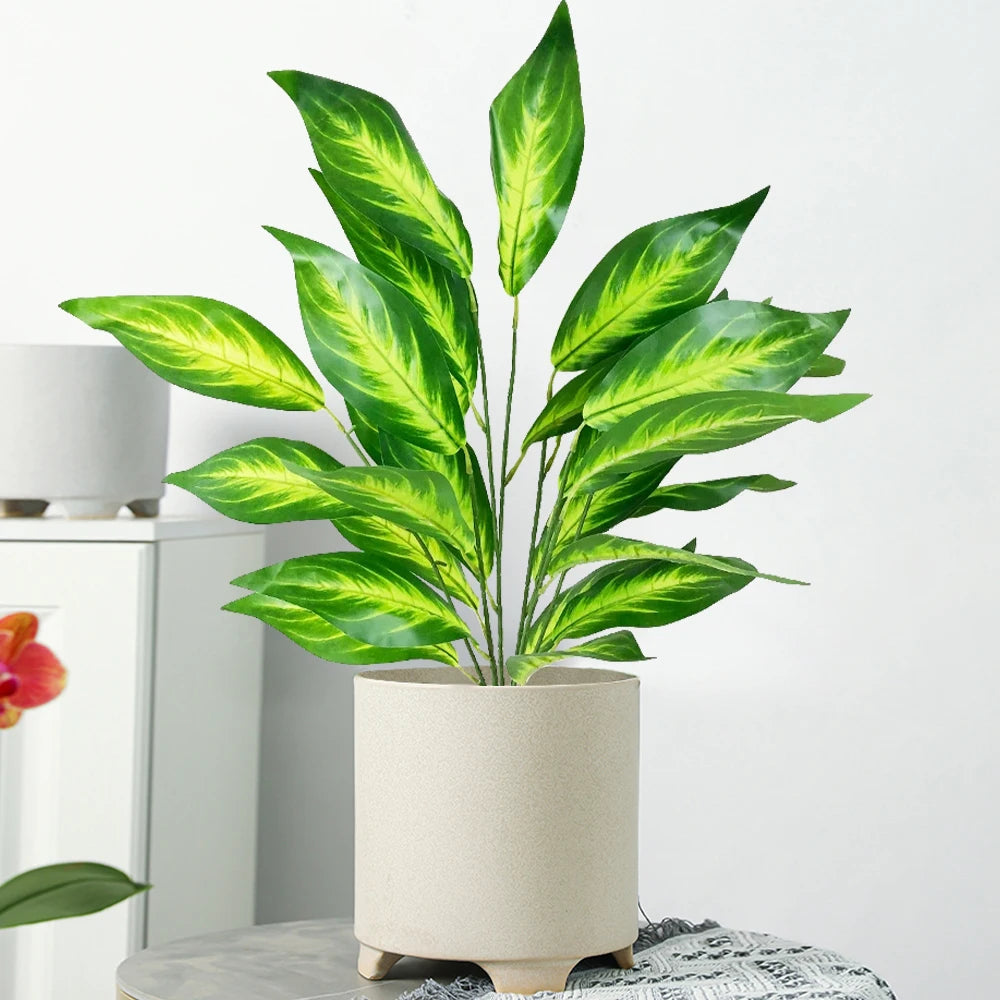 Large artificial tropical plant with leaves for indoor decoration