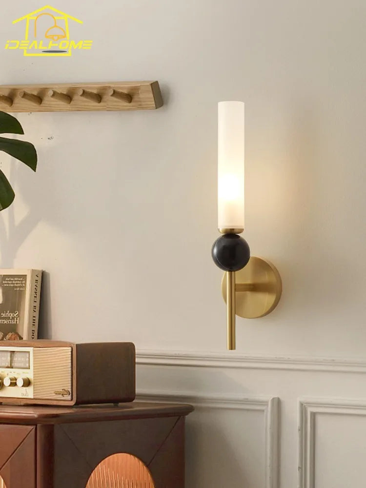 Designer marble and copper wall light for modern interiors