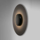 Modern circular designer wall light for an elegant interior