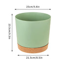 Large circular plastic indoor plant pot with drainage and tray