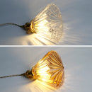 Modern glass and copper chandelier with minimalist design for creative lighting