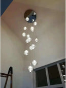 Glass ball pendant light for modern stairwell lighting