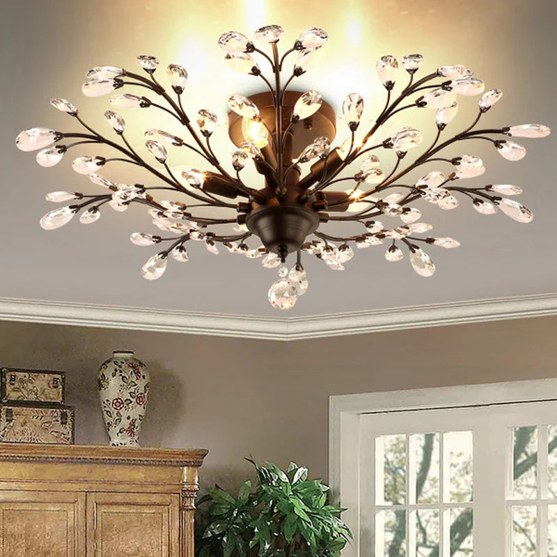 Vintage black metal chandelier with crystal pendants for modern interiors
