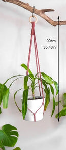 handmade macrame hanging plant holder made of natural cotton