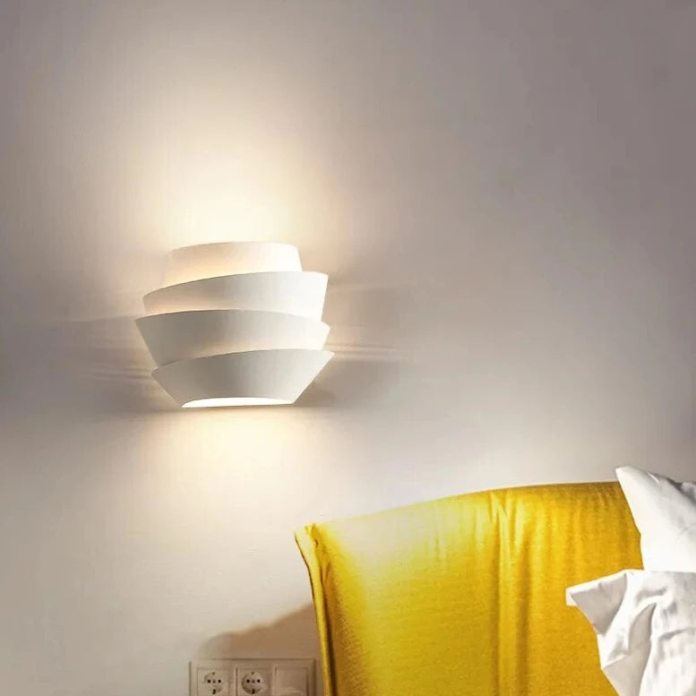 White designer wall light in pine cone shape