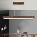 Modern LED chandelier in dark wood for interior decoration