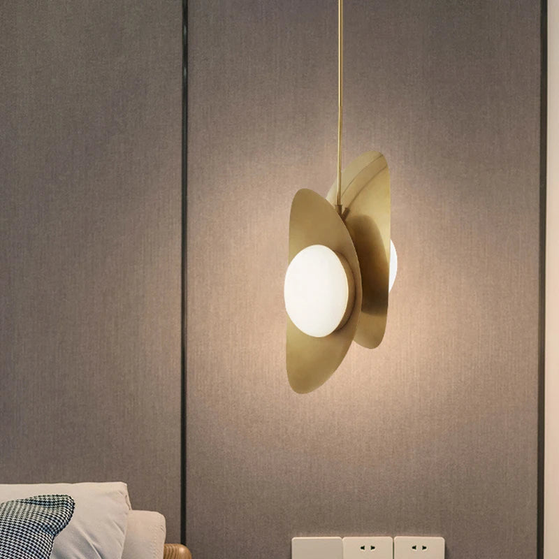 Small metal pendant light with modern glass globe