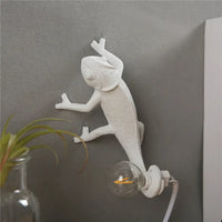 Modern and playful chameleon lizard desk lamp in resin