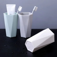 Solid plastic mouthwash and toothbrush cup