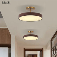 Modern round ceiling light with wood-effect finish for elegant interiors