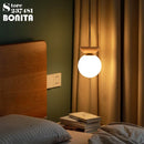 Round glass and Japanese walnut wood pendant light