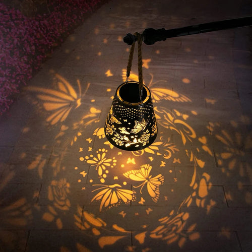 Solar hanging lantern with flower and butterfly projection for outdoor garden